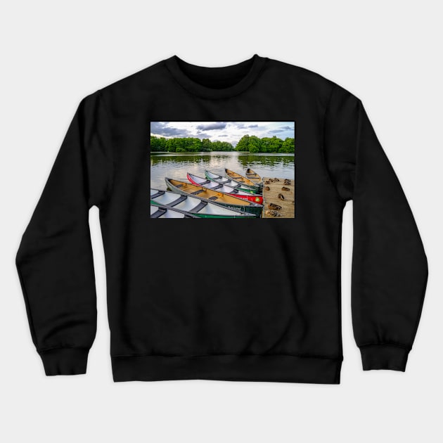 Moored canoes and kayaks Crewneck Sweatshirt by yackers1